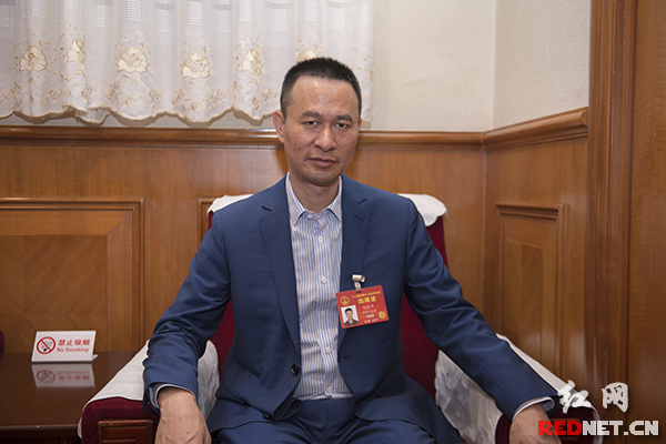 全国人大代表龙秋华:建议将个人所得税确立为