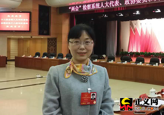 全国人大代表、陕西省宝鸡市金台区检察院检察长周喜玲。党小学 摄