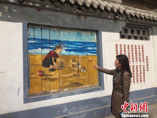 图为兰州市城关区酒泉路街道致力打造提升街巷文化气质。 徐雪 摄