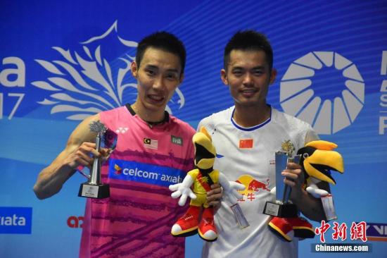 资料图:李宗伟与林丹。<a target=\'_blank\' href=\'http://www.chinanews.com/\'>中新社</a>记者 邓子富 摄