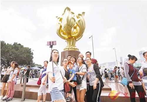 图片来源：香港《文汇报》。