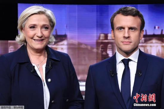 资料图：当地时间5月3日，法国大选第二轮投票在即，两位总统候选人马克龙和勒庞在拉普莱纳圣德尼开展选举前的电视辩论。