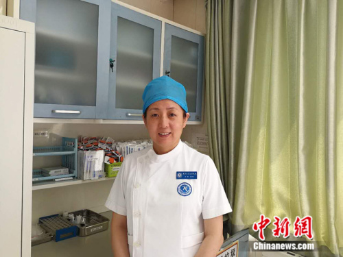 北京大学人民医院产科护士长孙敏 <a target=\'_blank\' href=\'http://www.chinanews.com/\' >中新网</a>记者 张尼 摄