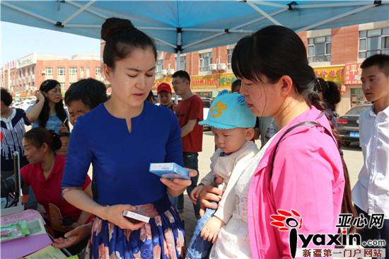 新疆吉木萨尔县社区开展计生协会日宣传活动|