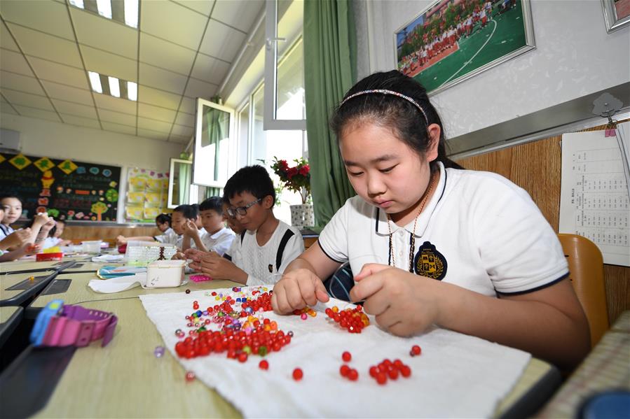 长春试行蓓蕾计划为解决小学三点半难题找