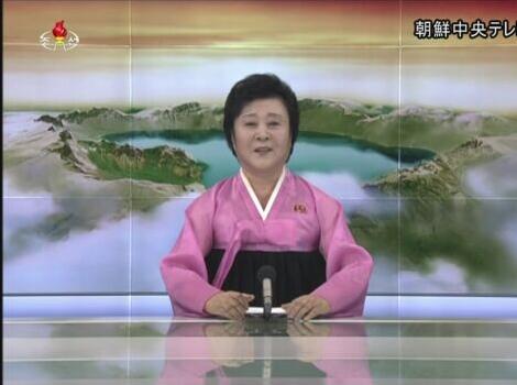资料图：李春姬在朝鲜电视台宣布导弹试射成功