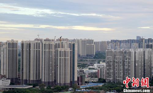 资料图:成都城区正在建设中的某小区。中新社记者 刘忠俊 摄