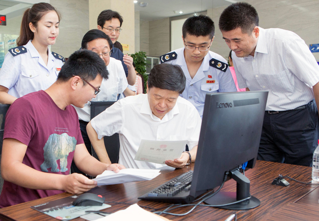 国税总局局长:持续推进税务部门放管服改革落