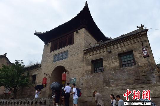 图为上庄村内的天官王府,府门上写有“冢宰第”。 主办方供图