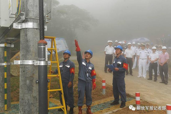 军地双方举行军民共建供电项目投运仪式。
