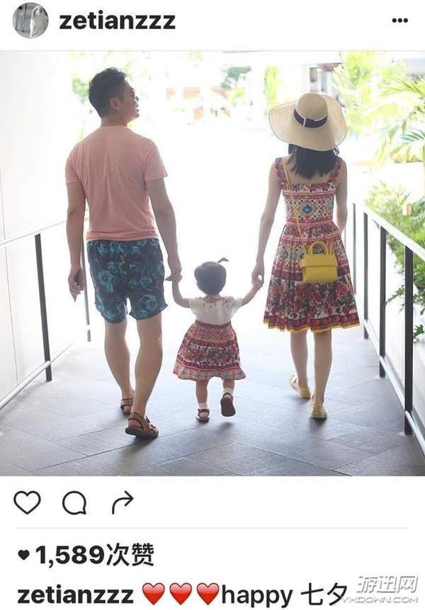奶茶妹妹晒一家三口手拉手的照片
