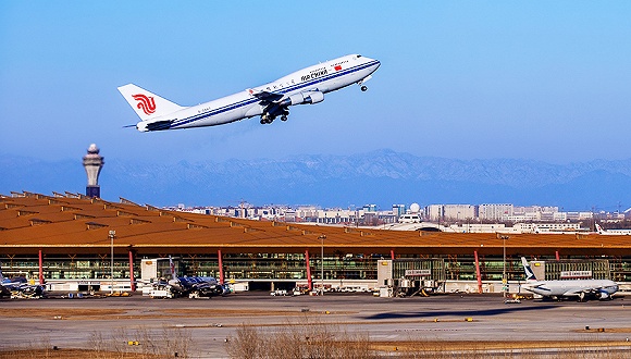 北京首都机场年旅客吞吐量首次破亿 成亚洲首