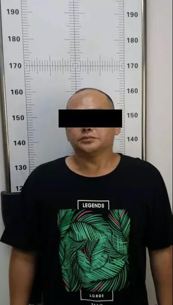 违法行为人张某