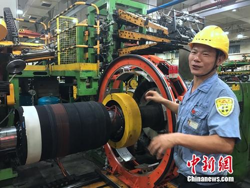 程海良讲授平常任务。<a target=\'_blank\' href=\'http://www.chinanews.com/\' >中新网</a> 吴涛 摄