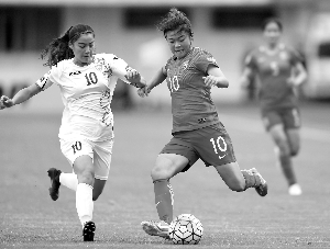 中国队以2比0战胜乌兹别克斯坦队