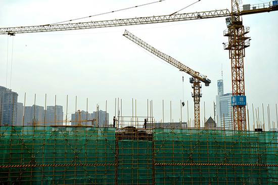 建设中的房地楼盘。视觉中国 资料图