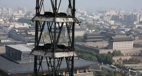 西安南门外百米烟囱起火原因初步判定,是否会