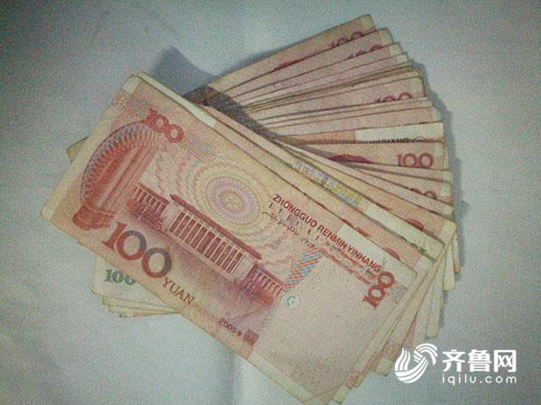 临沂一无聊孕妇赶集扒窃 现场缴获7部手机