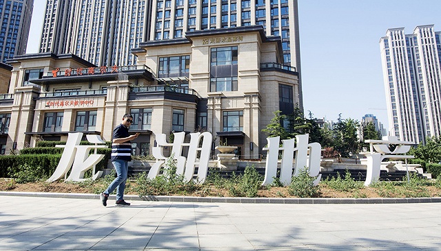 龙湖合并上海苏州公司 温介邦填坑两年后得重