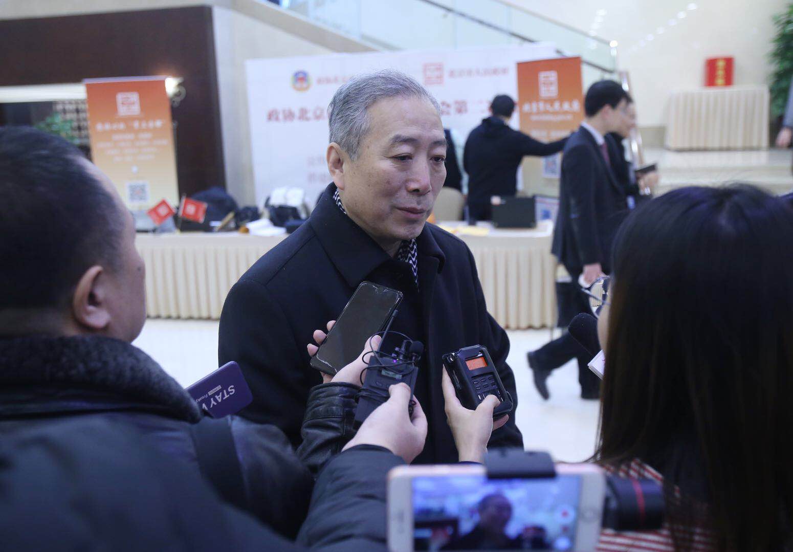 市政协委员宋慰祖报到并接受记者采访。新京报记者 王贵彬/摄