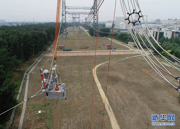 中国特高压工程完成带电作业模拟试验,途经新