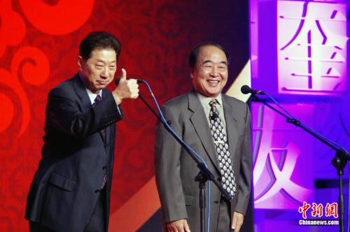 资料图:常贵田(左)。<a target='_blank' href='http://www.chinanews.com/'>中新社</a>记者 张道正 摄