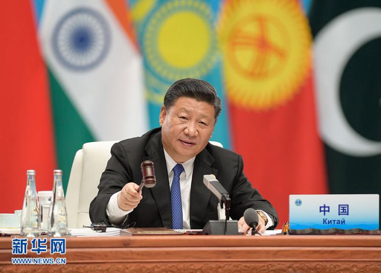 6月10日,上海协作安排成员国首脑理事会第十八次会议在青岛国际会议中心举办。国家主席习近平掌管会议并宣布重要说话。图片来历:新华社