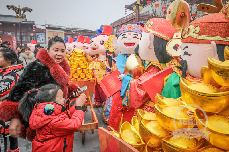 "财神赵公明巡街降福"活动,在雁南一路—慈恩路举行.