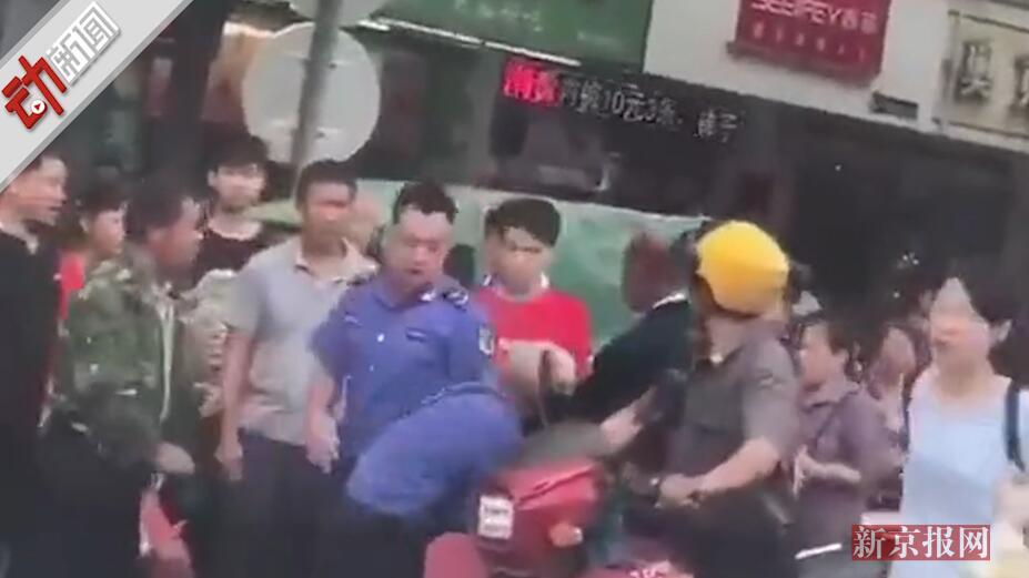 江西上饶一城管掌掴占道摆摊老人 官方:渉事城