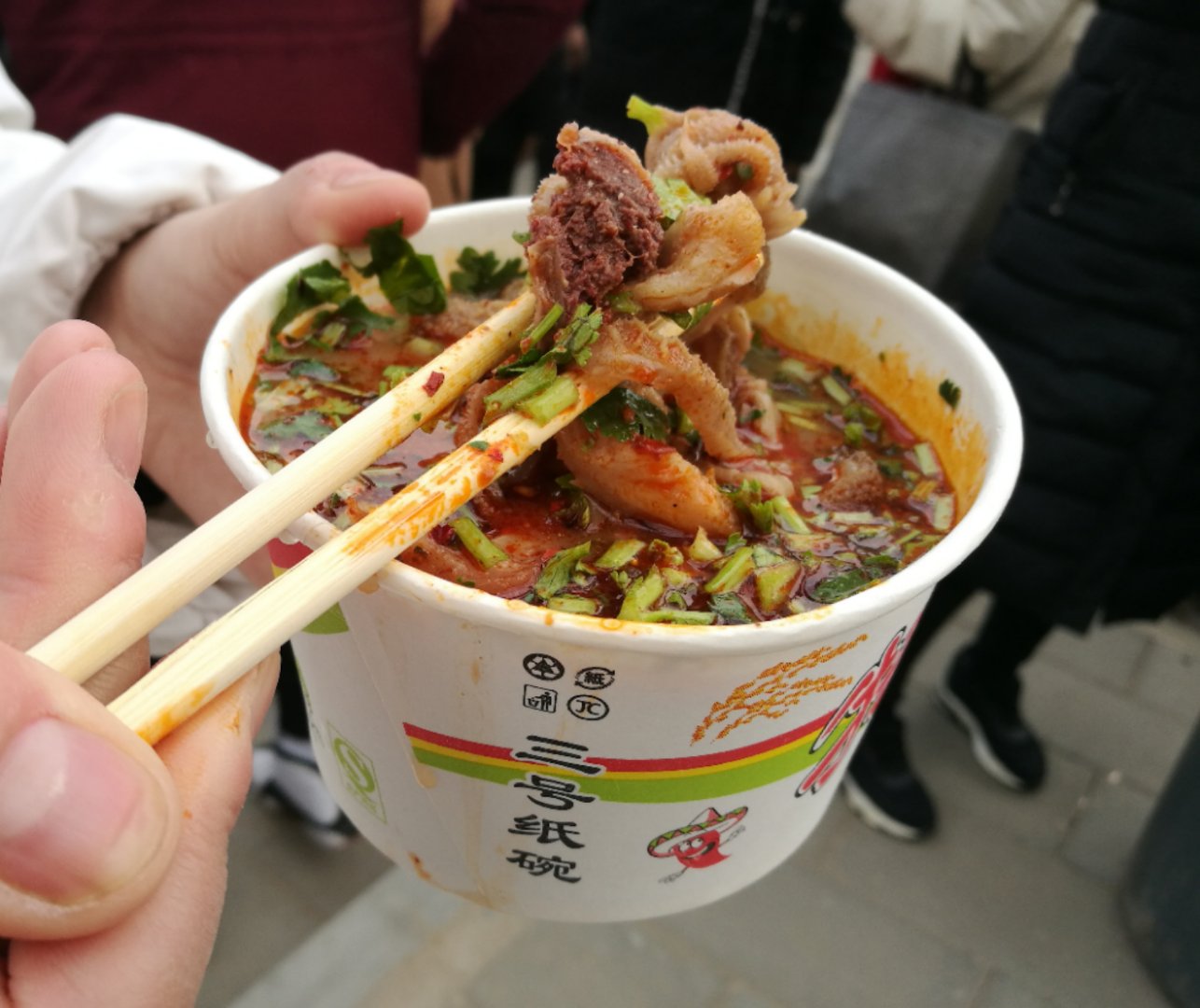 逛地坛庙会美食请收下这份攻略,烤肠火爆卤煮欠佳