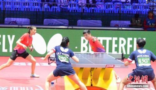 资料图:樊振东/丁宁在比赛中。<a target='_blank' href='http://www.chinanews.com/'>中新社</a>记者 马元豪 摄