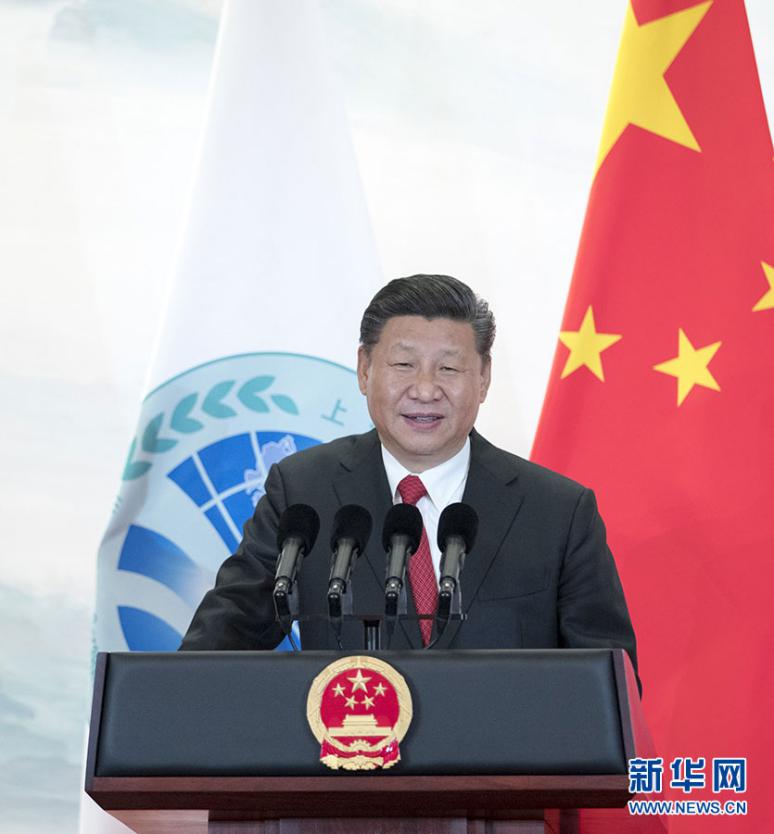 6月9日,国家主席习近平在青岛国际会议中心举办宴会,欢迎到会上海协作安排青岛峰会的外方领导人。这是习近平宣布致辞。图片来历:新华社