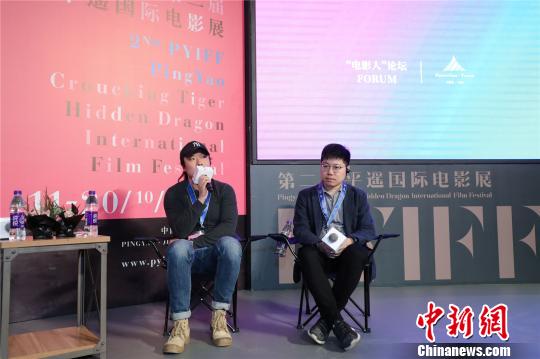 中国影评人、《中国新闻周刊》编委杨时旸,中国影评人木卫二。组委会提供