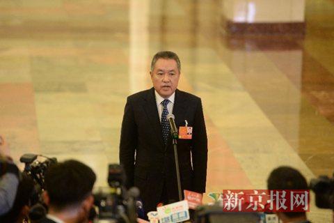 国家工商总局局长张茅在十三届全国人大一次会议“部长通道”上回答记者提问。新京报记者 侯少卿 摄