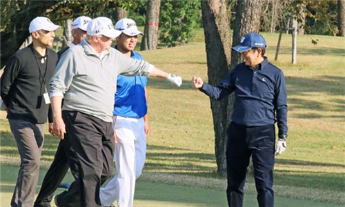 资料图：特朗普与安倍晋三