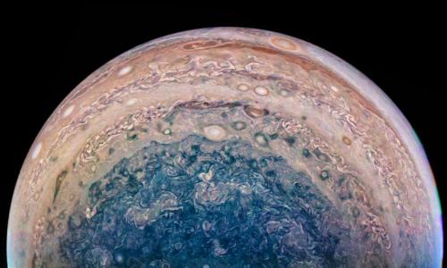 震撼！NASA公布木星南极美图 蓝色漩涡壮丽夺目(图)