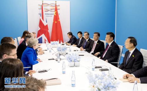 资料图:2017年7月7日,中国国家主席习近平在汉堡会见英国首相特雷莎·梅。 新华社记者 李学仁 摄 图片来源:新华网