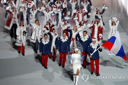 资料图片：2014年2月，在俄罗斯索契冬奥开幕式上，俄罗斯代表团正在入场。（韩联社）