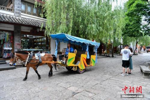 资料图:丽江束河古镇。 中新社记者 任东 摄