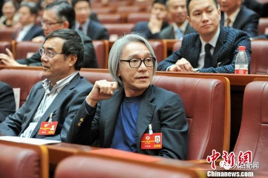 周星驰出席广东省政协闭幕大会(图/中新社)