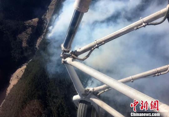 雅江恶古乡“2.16”森火现场已无明火,但烟点较多。南航空护林总站提供