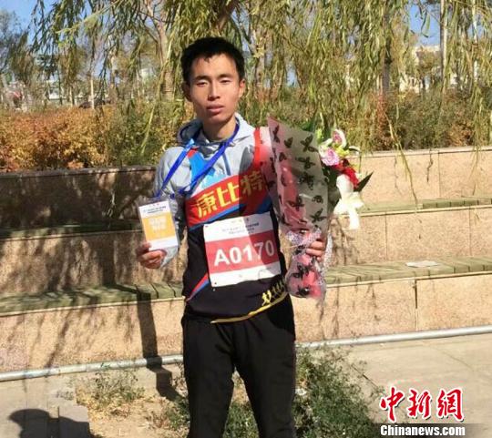 资料图:现就读于西北师范大学体育学院的大二学生邱旺东?<br></p>
</p><br></p><br></p><img alt=