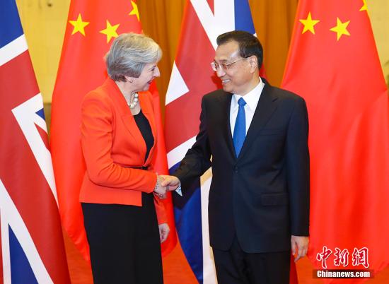 外媒聚焦特蕾莎·梅访华 贸易合作是主轴|特蕾