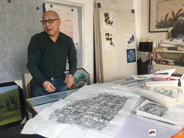 装裱师为新疆岩画穿行深山,花费数万元拓片、