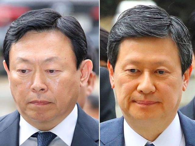  辛东彬（左）和辛东主。（新华/法新）