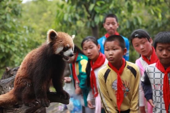 普洱太阳河国家公园 公益助学开启希望小学师