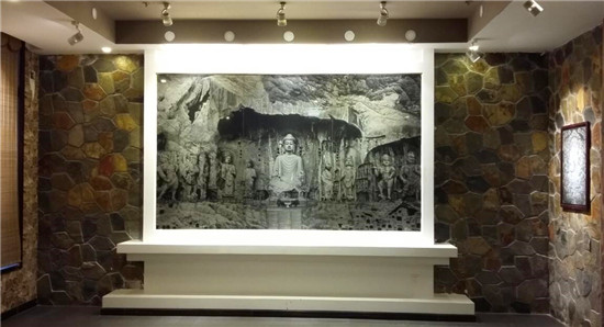 石·影雕作品——龙门石窟目前,钱三毛艺术馆正积极参与"一带一路"