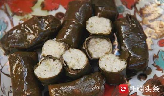 新疆黄金叶子食品有限公司出口的葡萄叶加工的朵玛。