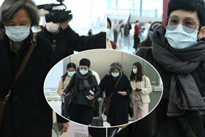 吴君如陈可辛夫妇现身机场