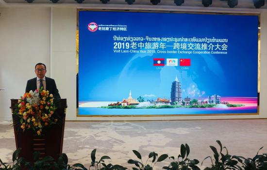 (老挝磨丁经济特区管理委员会主席、海诚集团董事长周昆)